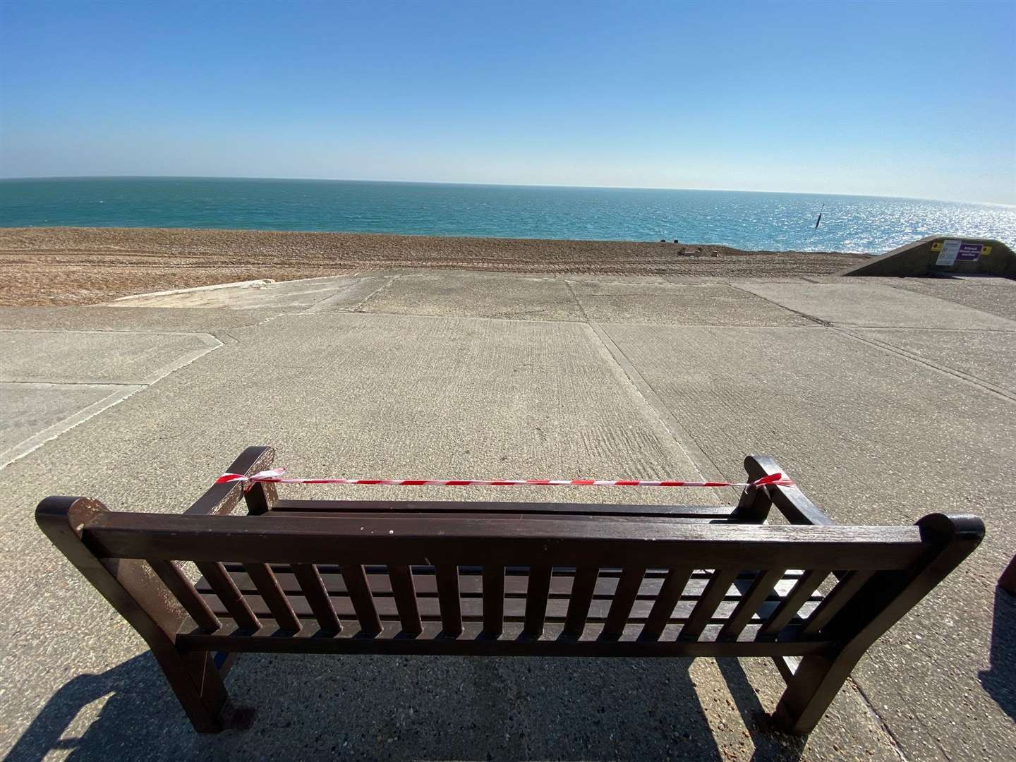 Lockdown loiterers are discouraged by this taped-off bench on Sandgate seafront.