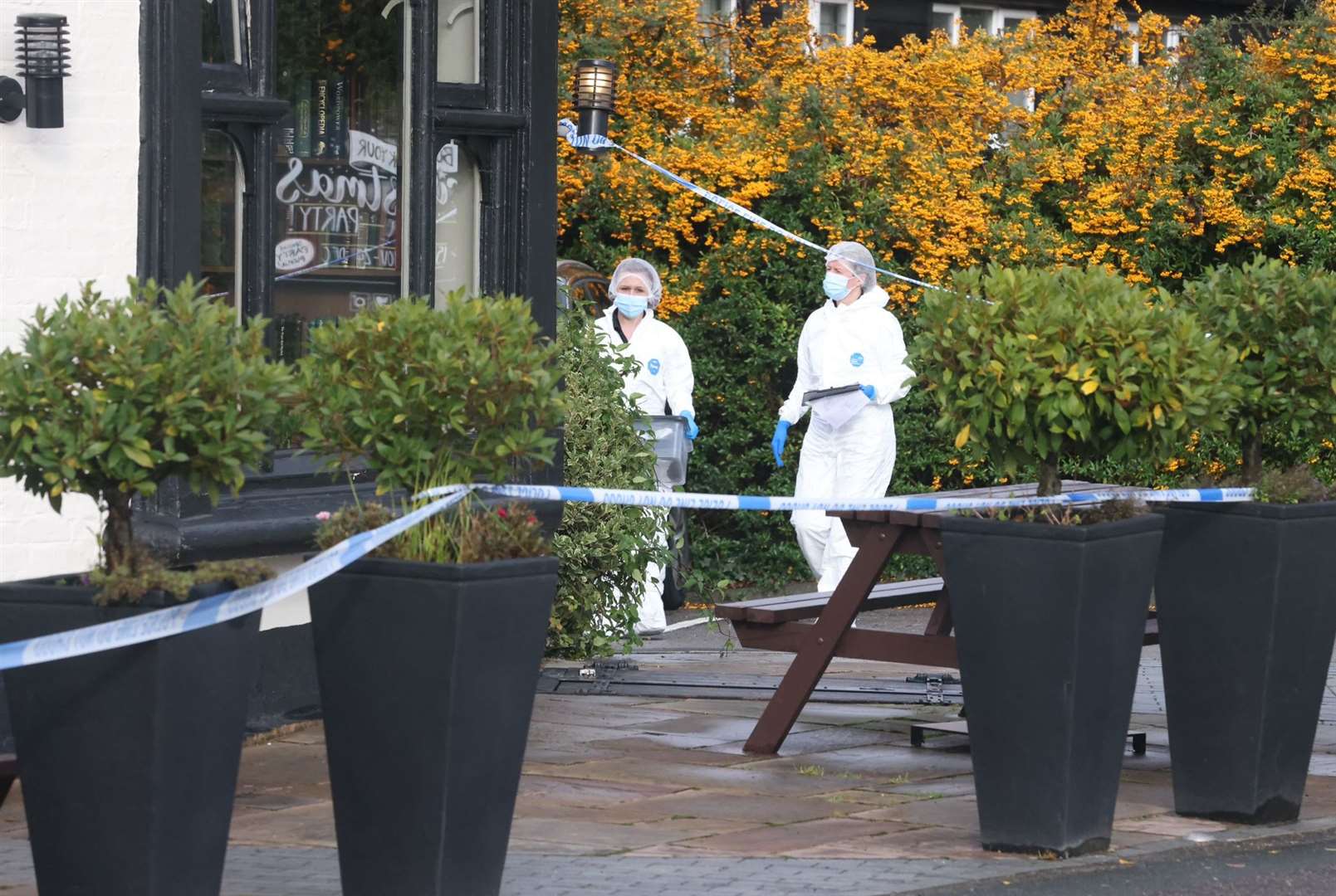 Forensic officers after the incident where Craig Allen died. Picture: UKNIP