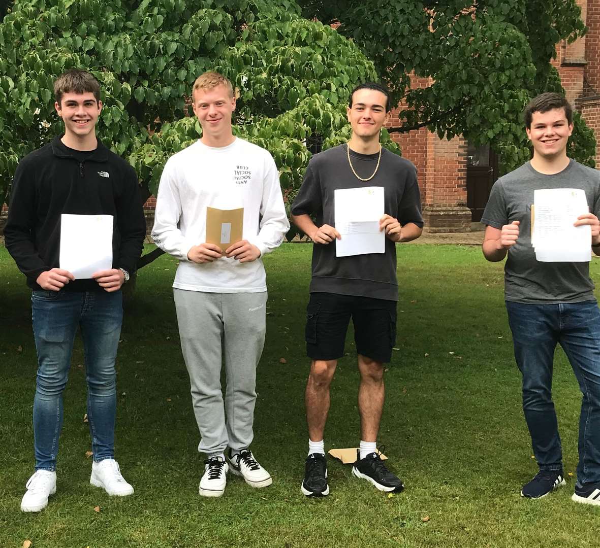 Maidstone Grammar School pupils collecting their GCSE results this morning, from left, Nathan Gray, Toby Henley, Owen Gough and Dan Gray