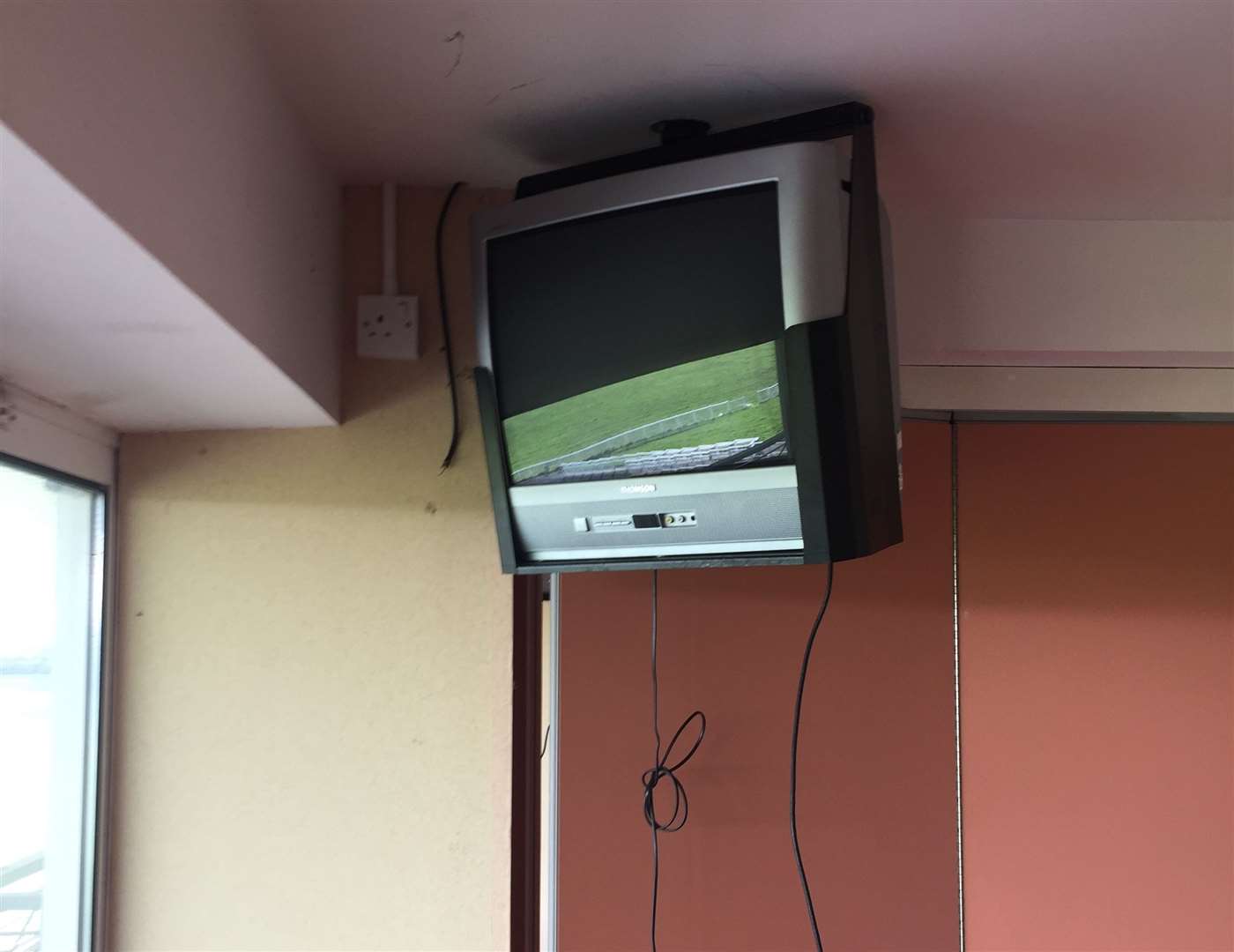 An abandoned TV in a hospitality suite