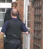 Police officers arriving at one of the addresses in the Temple Hill area of Dartford last Monday