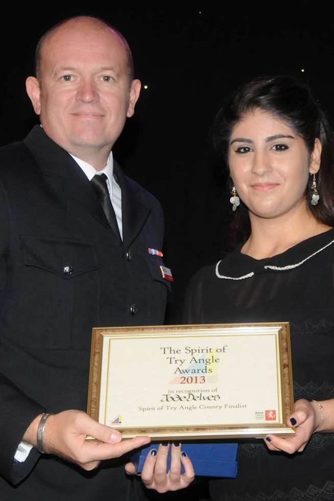 Jade Delves receives her silver Try Angle award from Police Chief Insp Lee Russell