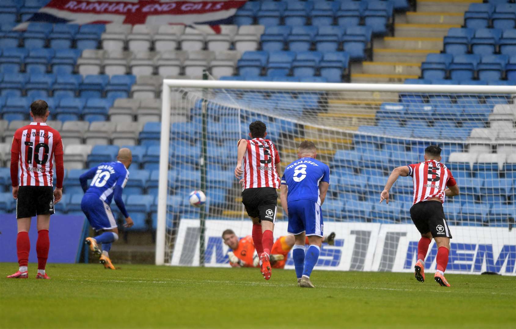 Kyle Dempsey watches on as Gillingham's penalty is saved Picture: Barry Goodwin