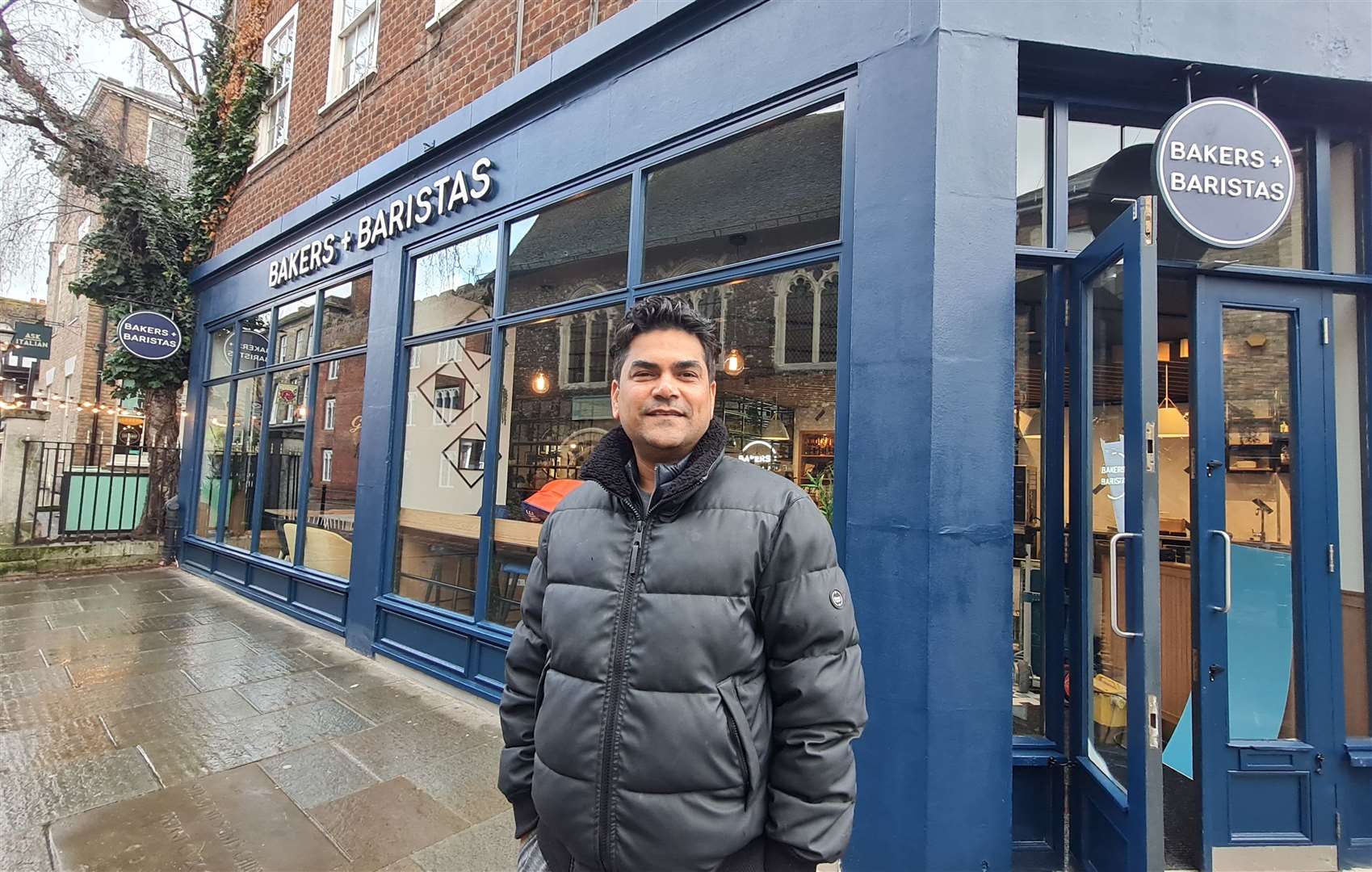 Franchise holder Amer Qayyum outside the new Bakers + Baristas branch in Canterbury