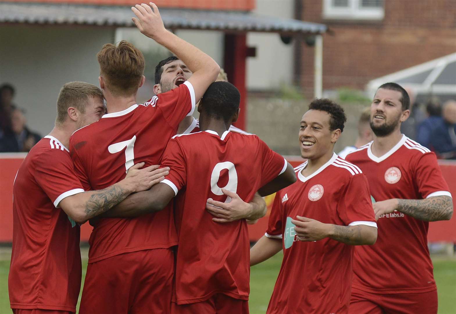 Hythe celebrate Tom Carlton's goal in the 2-0 win over Haywards Heath at Reachfields on Saturday Picture: Paul Amos
