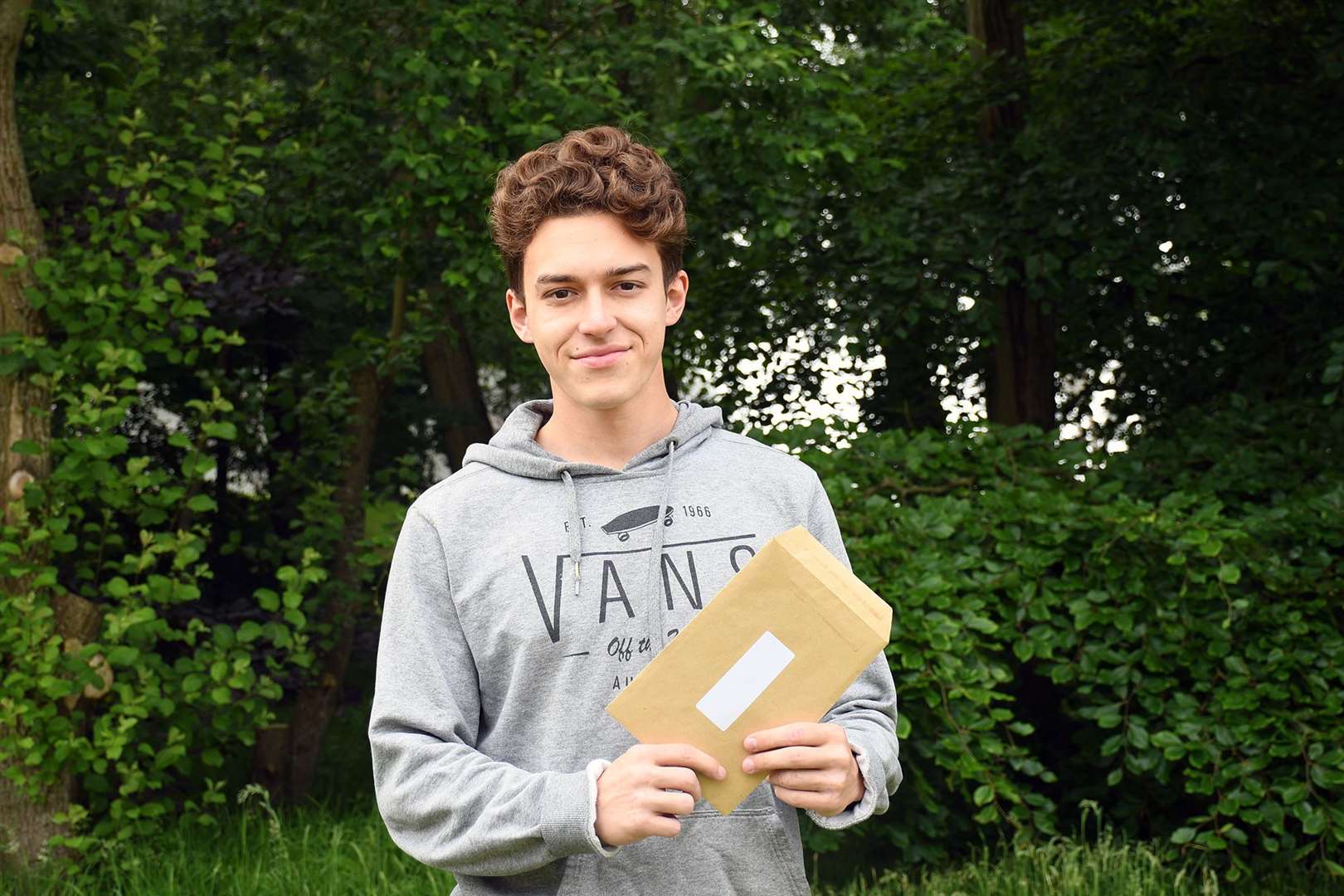 Student Sebastian Brown with his grades. Picture: Duke of York's Royal Military School