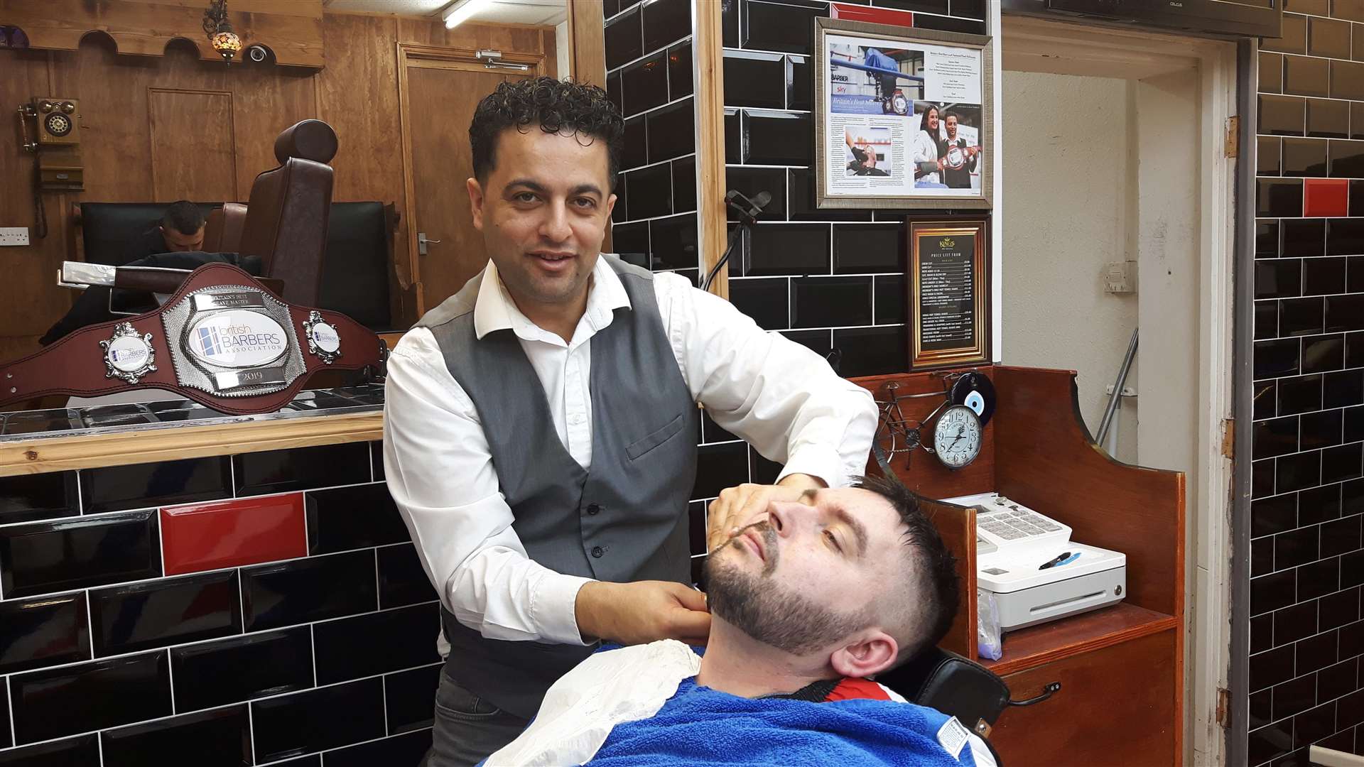 Enver 'Efe' Yeshilbulut with customer Blake Ashmore who used to travel to North London to be groomed before meeting the Deal barber (7493981)