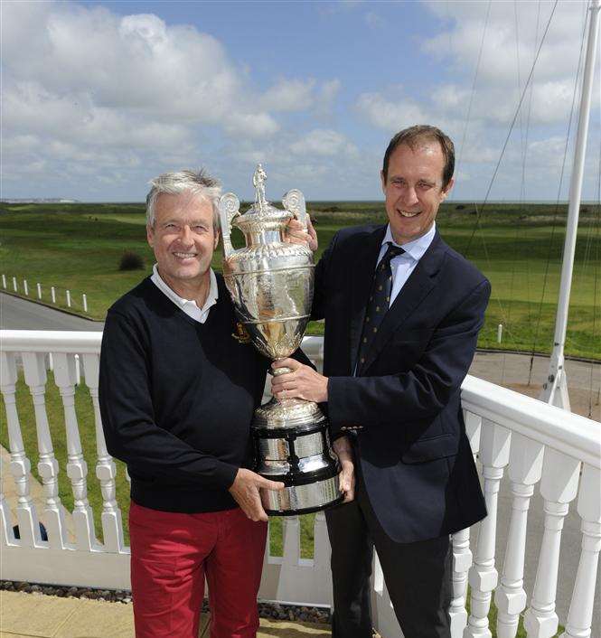 Royal Cinque Ports club professional Andrew Reynolds and secretary Martin Bond with Amateur Championship trophy