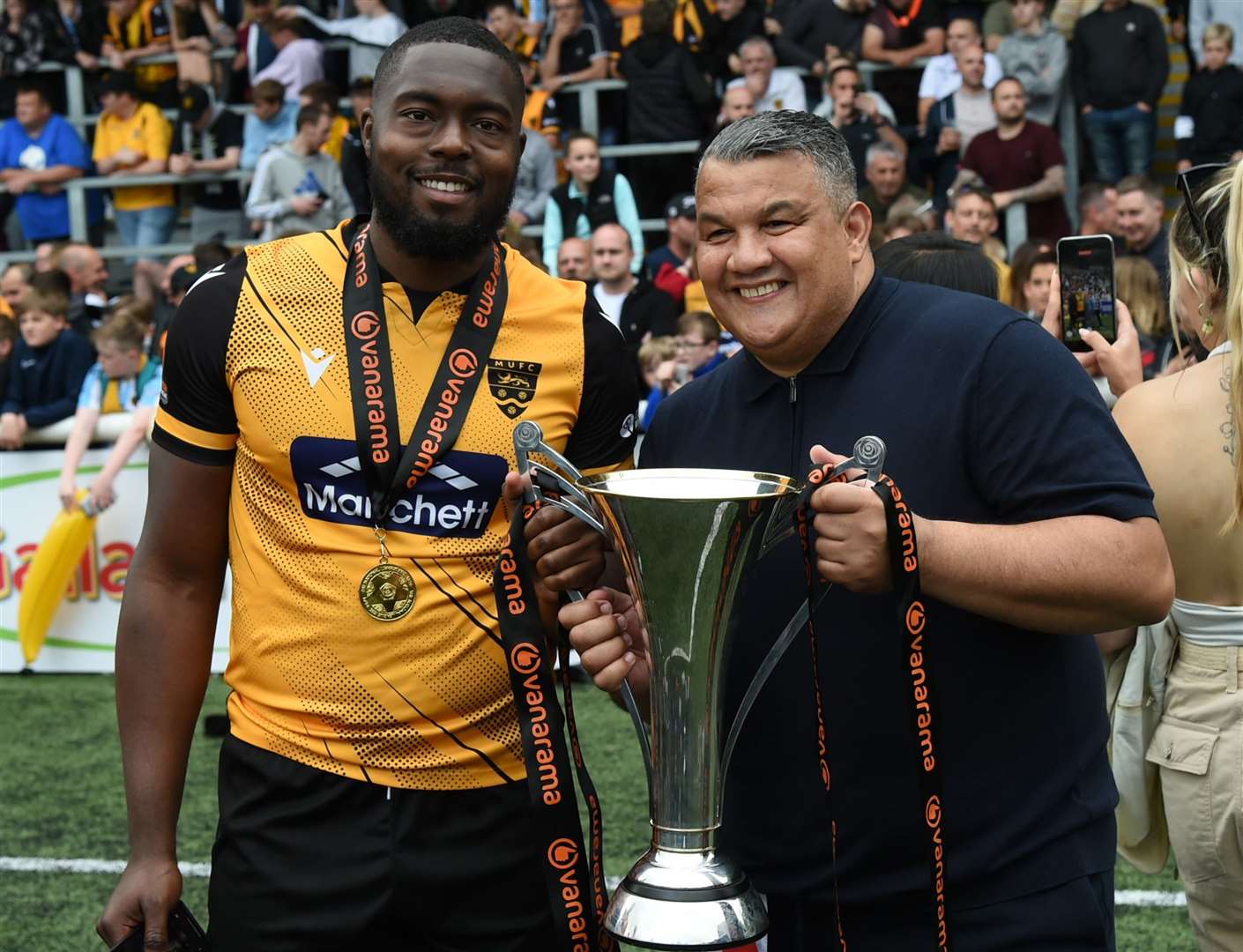 Jerome Binnom-Williams and Hakan Hayrettin, celebrating Maidstone's National South title win in 2022, have been reunited at Dulwich Hamlet. Picture: Steve Terrell