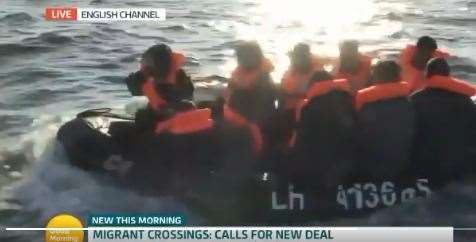 A group of men are seen on the small boat. Picture credit: Good Morning Britain