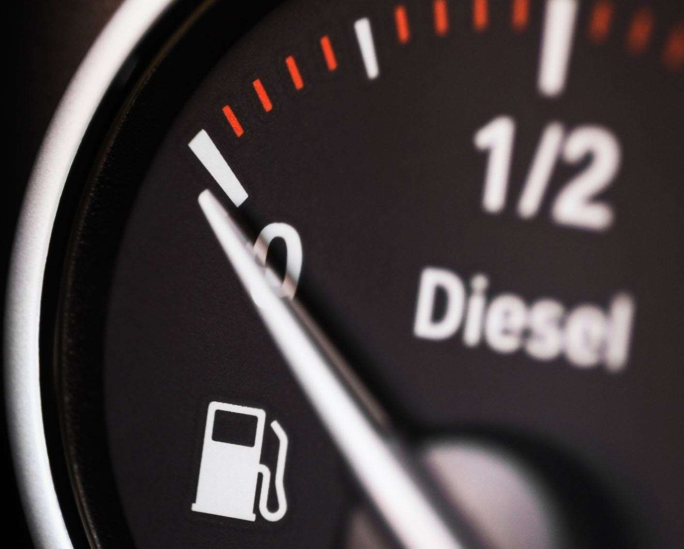 Close-up shot of a fuel gauge in a car. (5442476)