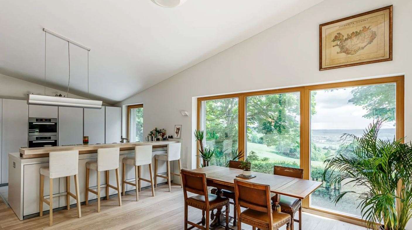 Enjoy breakfast in the open plan kitchen overlooking the sun deck and garden. Picture: Eden Estates