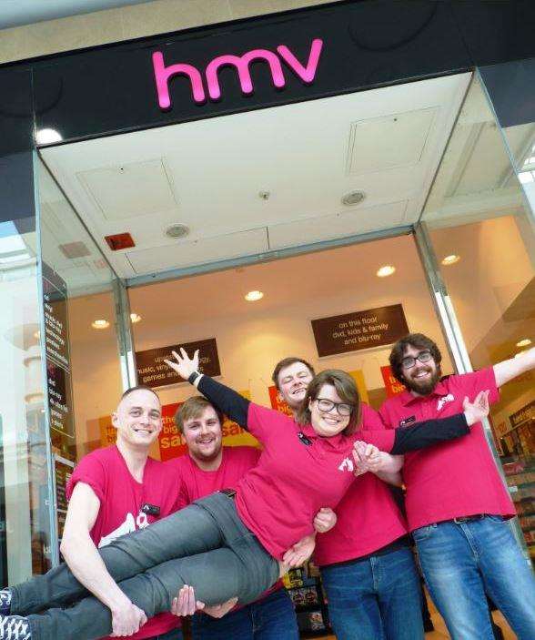 Happy staff at the reopened store