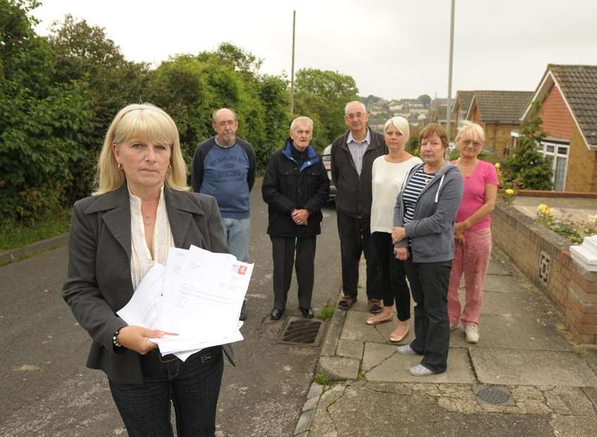 Campaigner Tina Brooker with letters to the council and angry residents
