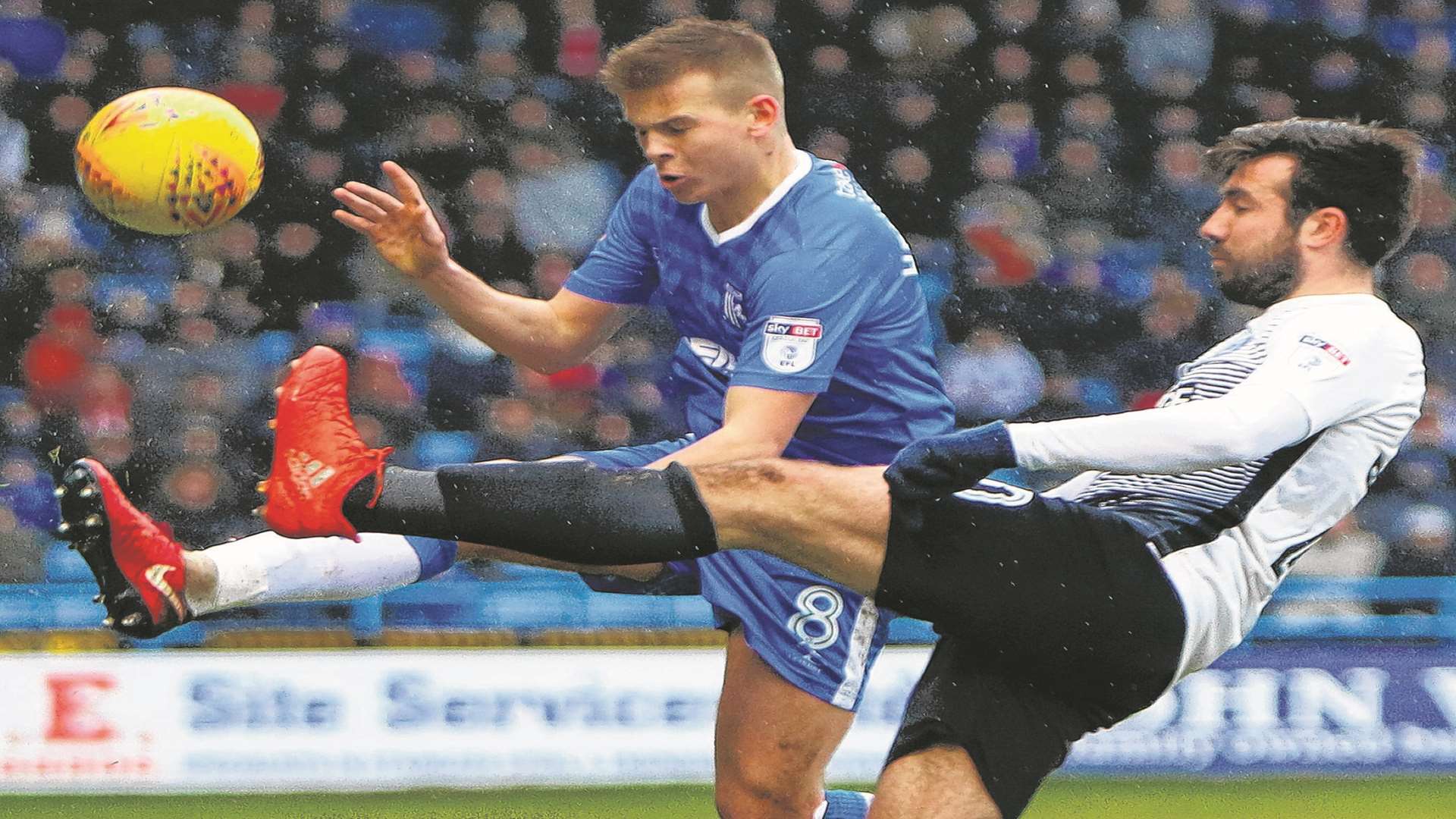 Jake Hessenthaler competes against former Gills man Michael Doughty. Picture: Andy Jones