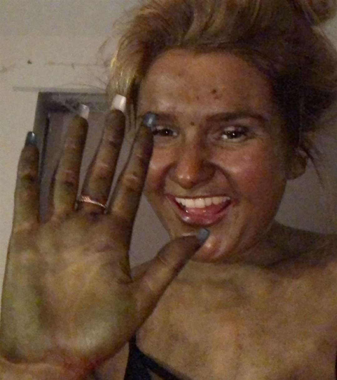 Lilly Vigus after slapping fake tan on which turned her green. Picture: Lilly Vigus