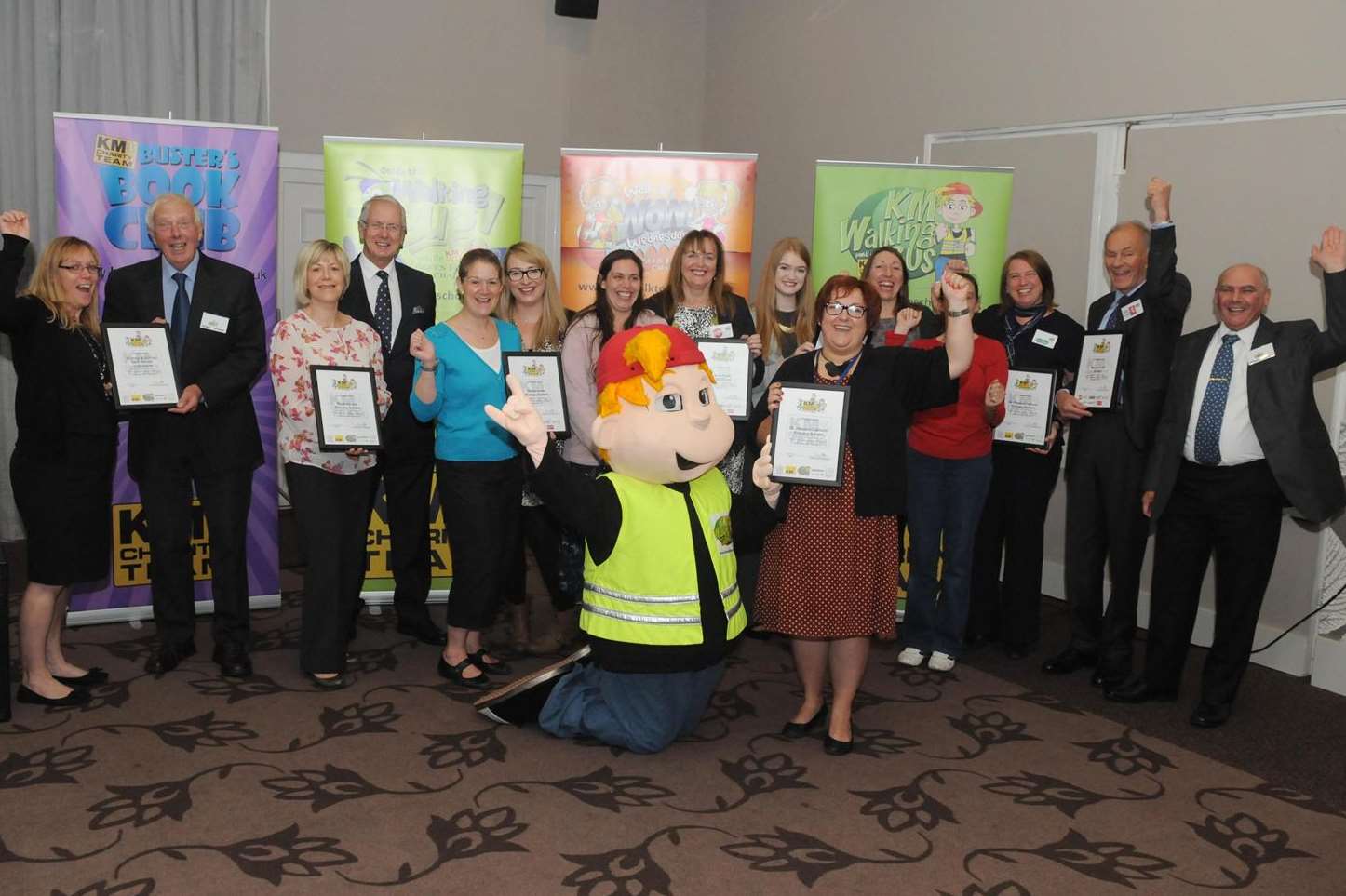 Schools celebrate their walking bus birthdays with Walk to School mascot Sam and sponsors Mini Babybel, Orbit South, Leeds Castle, Specsavers, Kent County Council and Medway Council at the KM Charity Team's annual forum at Mercure Great Danes Hotel, Maidstone