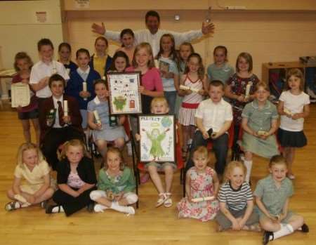 Children with their certificates and prizes for the Litter Angels competition at Sittingbourne Community College. Pictures: John Westhrop