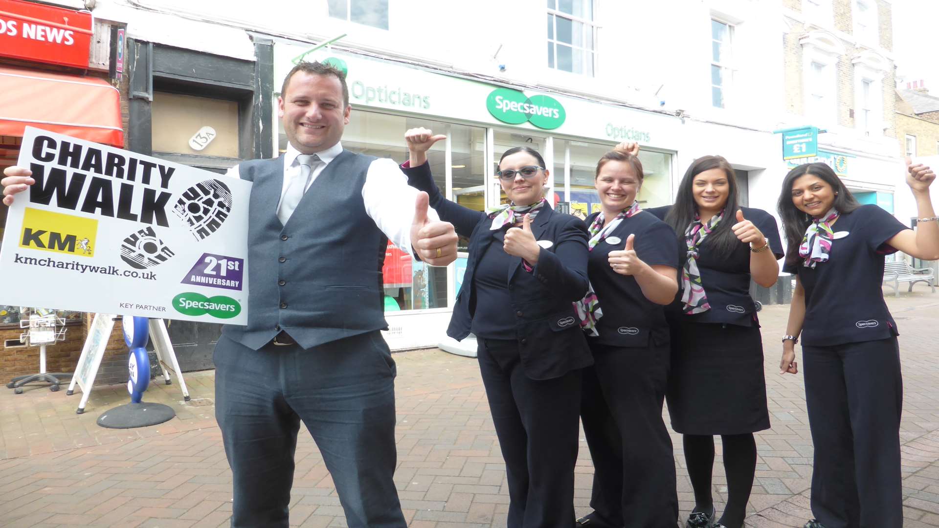 Specsavers Kent Regional Chairman Matt Trusty and staff show their support for the 21st KM Charity Walk staged on Sunday, June 26 from Mote House, Maidstone.