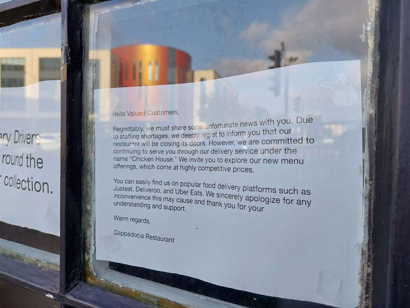 A notice displayed on the window of the Cappadocia restaurant