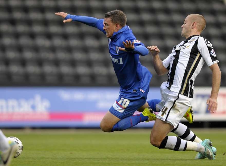 Cody McDonald is fouled against Notts County on Saturday. Picture: Barry Goodwin