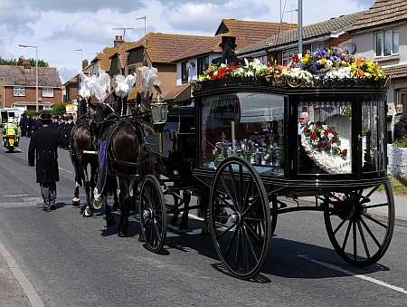 The hearse proceeds up to the church in Chapel Street. Funeral of PC Phillip Pratt, at the Minster Bethel Church, Chapel Street, Minster. Picture: Andy Payton