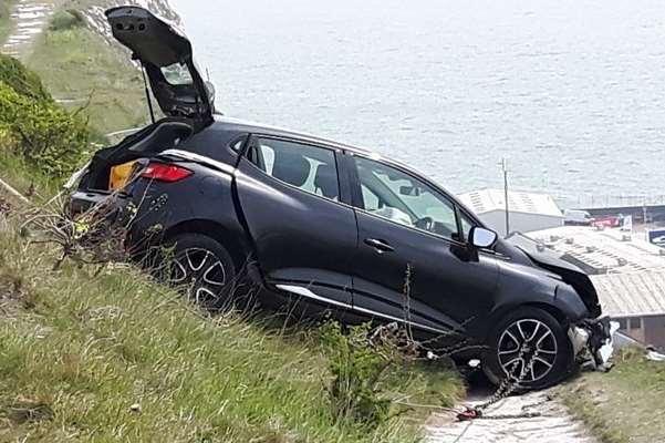 A crashed car was left near the edge of the White Cliffs in April.