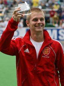 Ashley Jackson receives his International Hockey Federation Young Player of the Year award