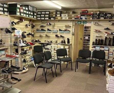 The shop sold shoes, belts and boots and work footwear