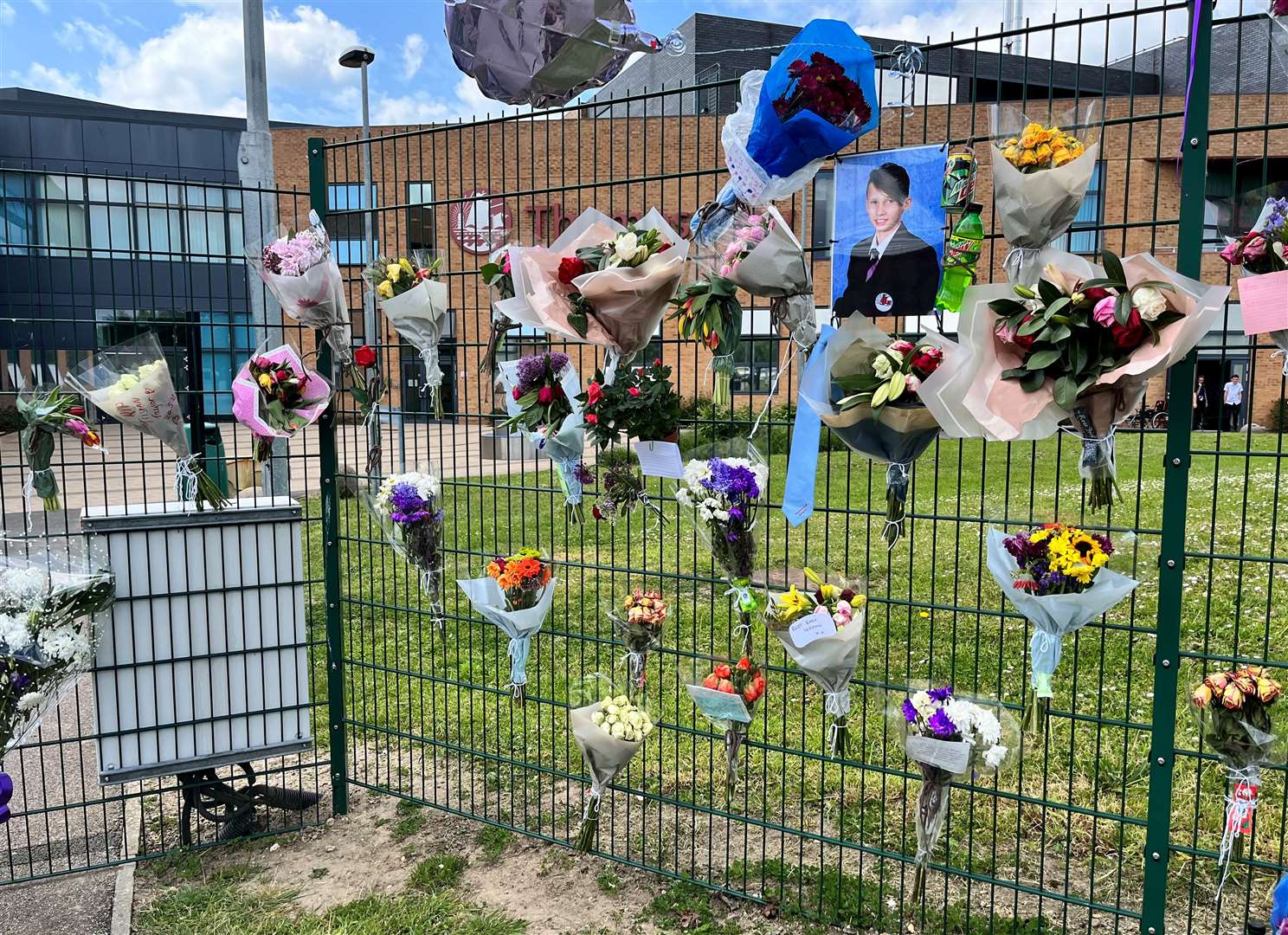 Just some of the tributes for Tristan Taylor left at Thamesview School
