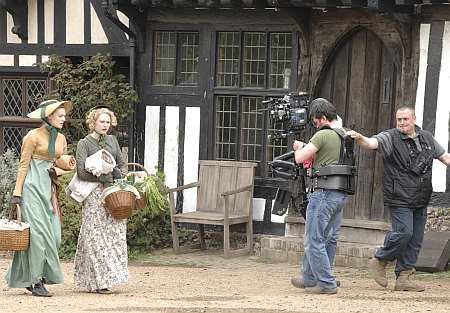 Filming a scene as Chilham Square is transformed for the BBC production of Emma. Picture:Chris Davey