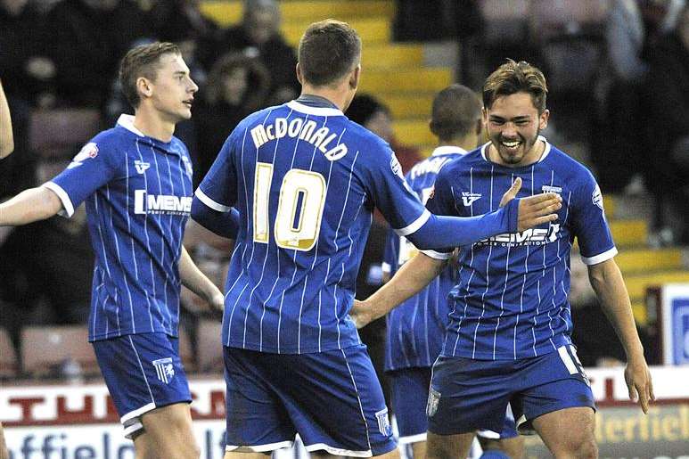 Cody McDonald celebrates scoring for Gills Picture: Barry Goodwin