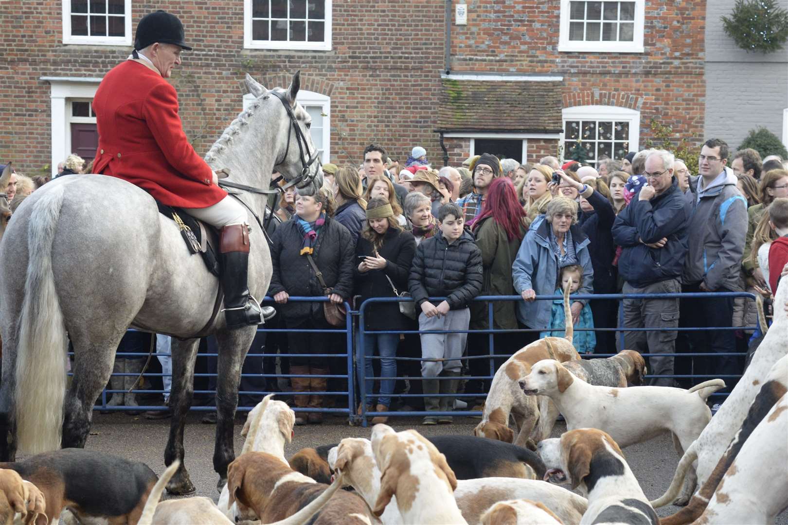 The scene in Elham village square at the meet of the East Kent Hunt with West Street on Boxing Day. Picture: Chris Davey