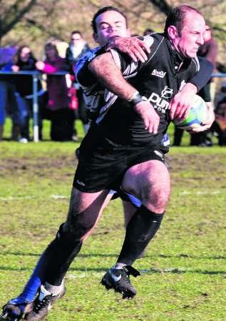 Peter King tries to wrestle clear against Lewes on Saturday