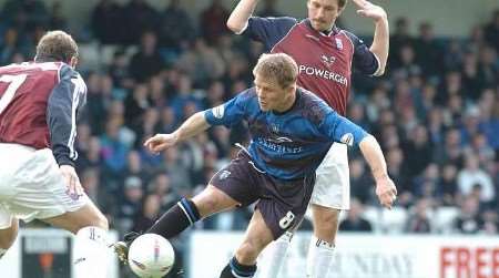 BATTLING ON: Hessenthaler wins a midfield tussle against Ipswich. Picture: GRANT FALVEY.