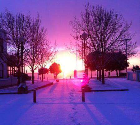 Sunrise in the snow on Dover seafront taken by Port of Dover worker Antigone Cote