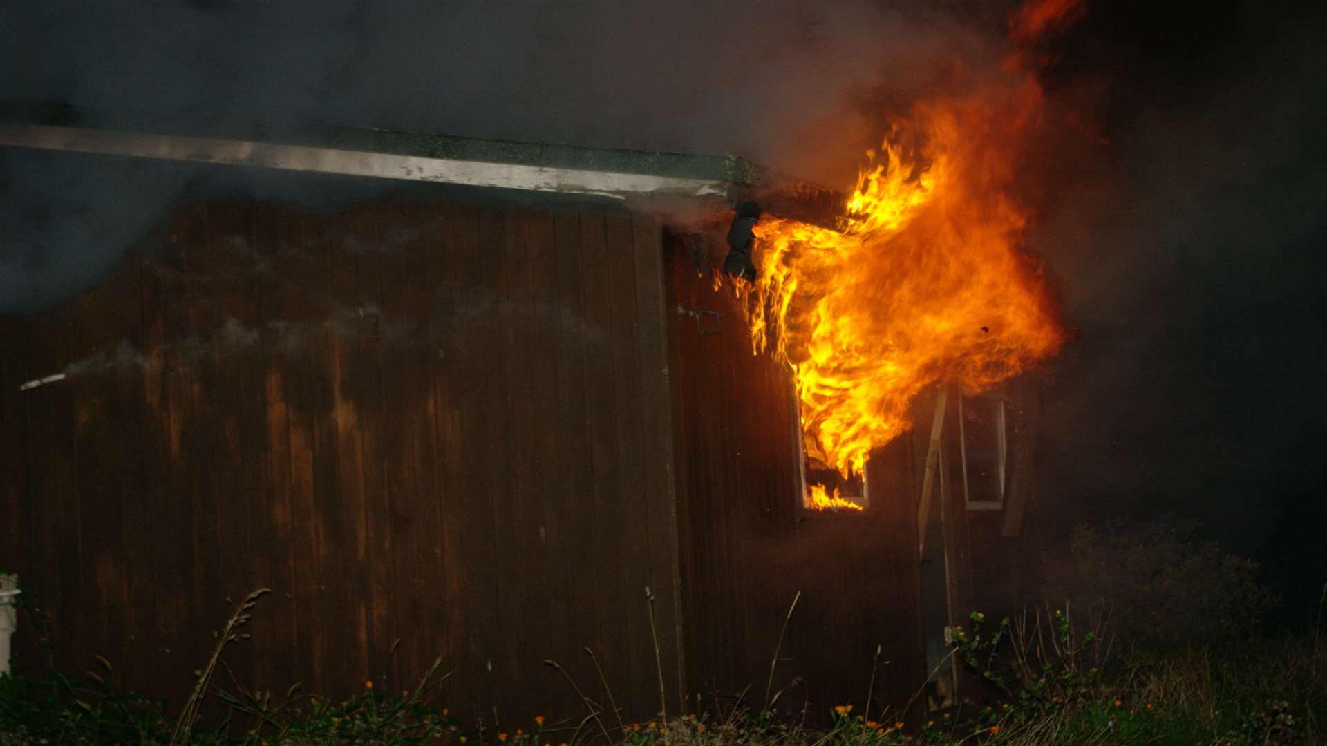 Flames erupt from a chalet at Allhallows Leisure Park. Picture Stanley Arrowsmith