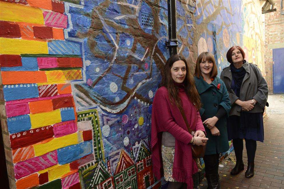 Ascension Lorente Huguet, Jenifer Hedley and Glynis Thomson with their mural outside the Centre for Creativity and Enterprise in St John's Lane, Ashford