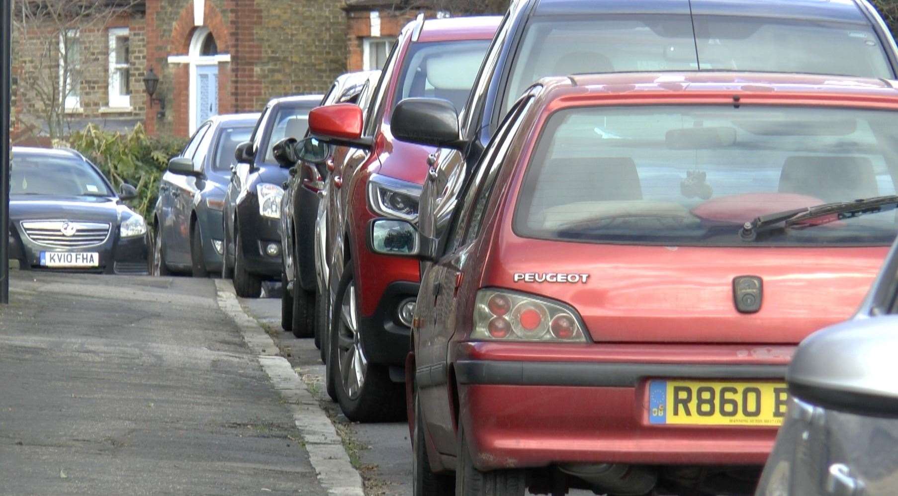 Households with more than three cars could be paying £135 a year for parking permits. Stock picture