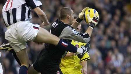 HOW IT'S DONE: Dean Kiely making a save against West Brom. Picture: MATT WALKER