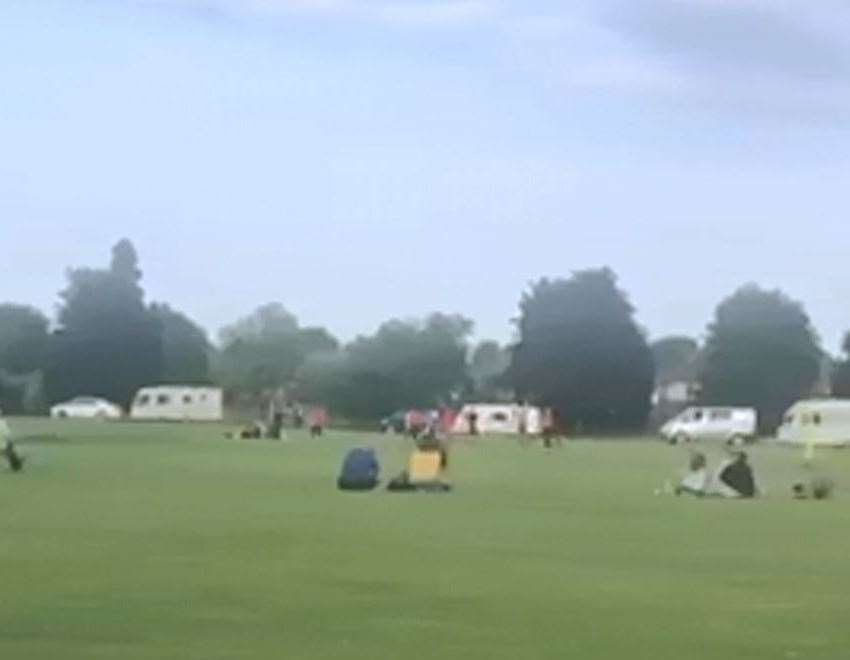 Travellers invade King George's Playing Field in Faversham, as children have football coaching. Pic: Gary Telfer (13565916)