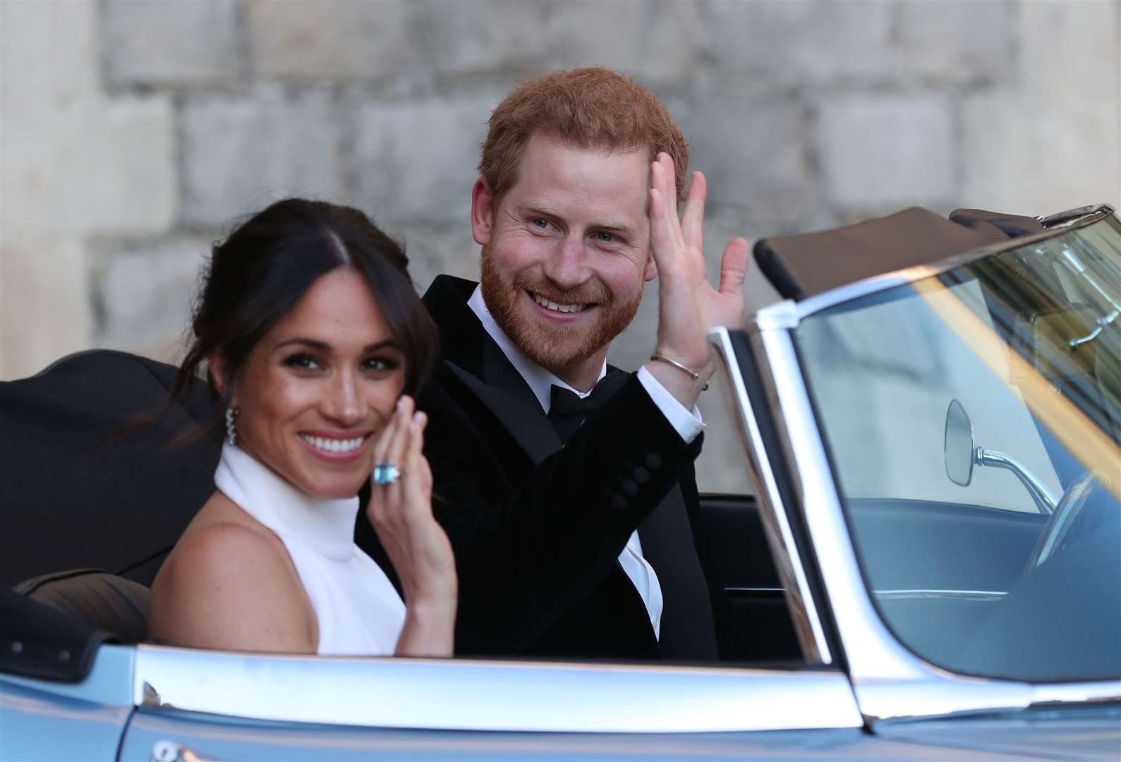 Prince Harry used the Audi for a year prior to his marriage to Meghan Markle, pictured here at their wedding in 2018. Photo credit: Steve Parsons/PA Wire