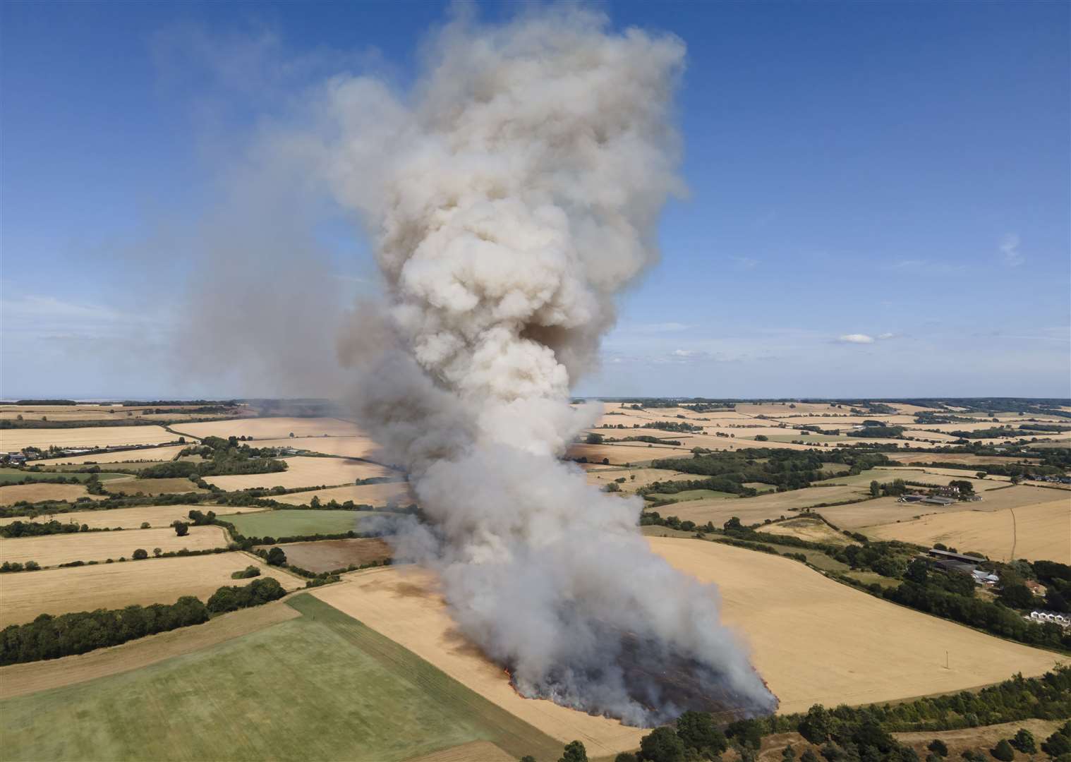 View of the flames showing the fire in fields around Lenham Heath on Saturday afternoon. Picture: Nathan Hammonds Photography