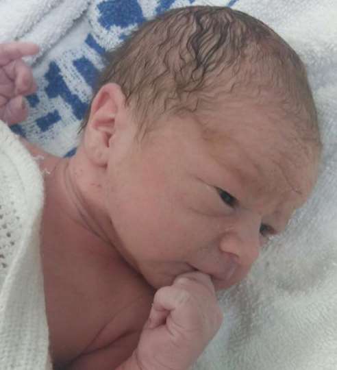 Christopher Lee David Collins was born at the QEQM hospital on New Year's Day
