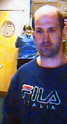 The man police want to speak to in connection with an assualt at Betfred in Canterbury