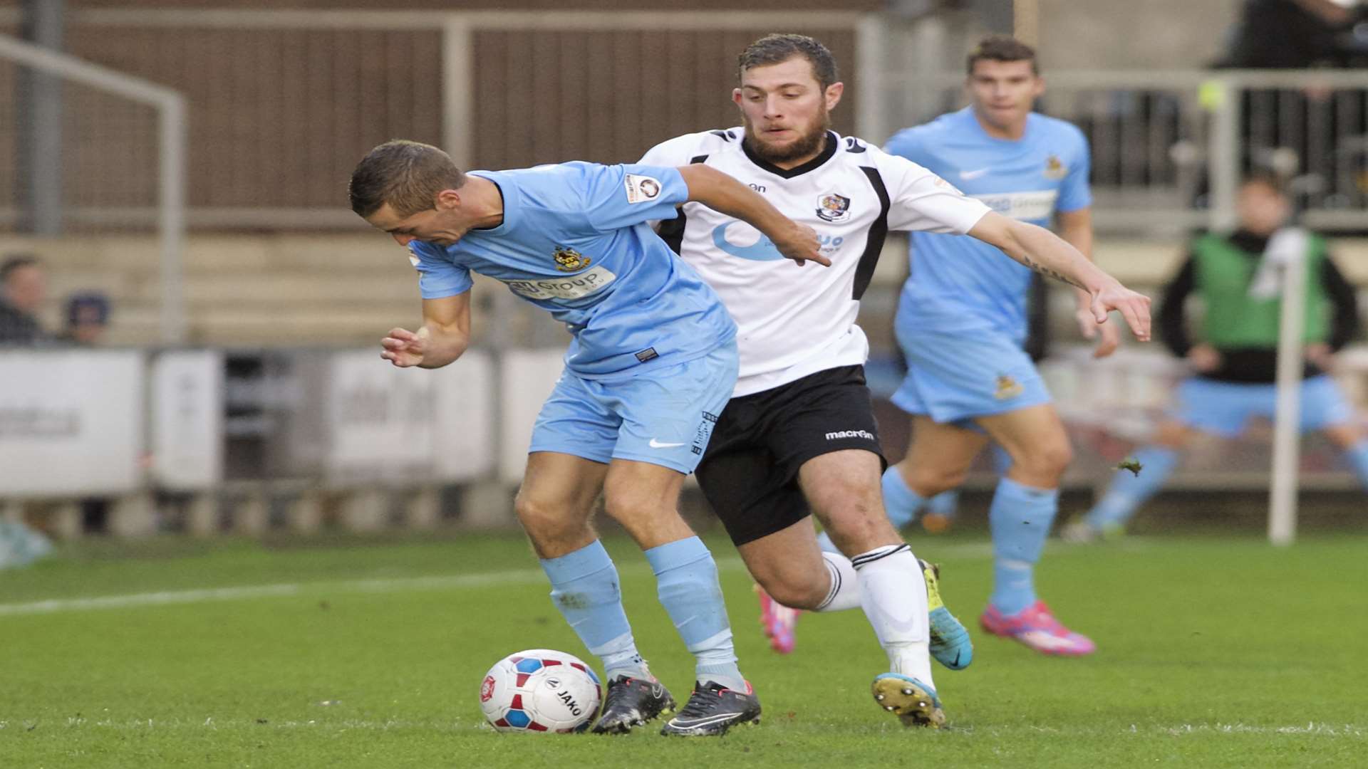 Ryan Hayes tries to win the ball back against Southport on his 300th start for Dartford Picture: Andy Payton