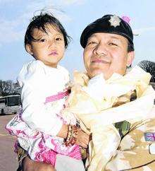 Sgt Milan Gurung greeted by daughter Naina on his return from Afghanistan