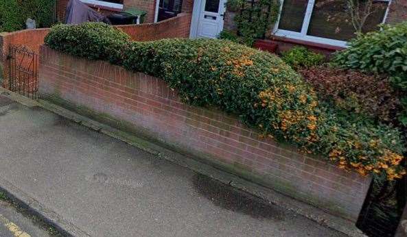 The property's brick wall before the crash. Picture: Google