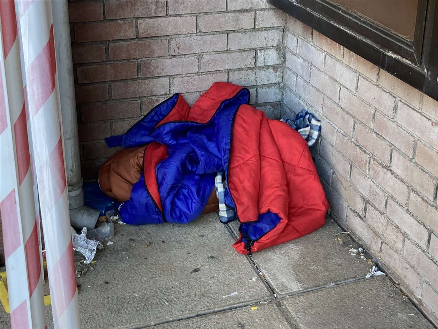 A coat and sleeping bag outside a church in Sittinbgourne. Stock picture: John Nurden