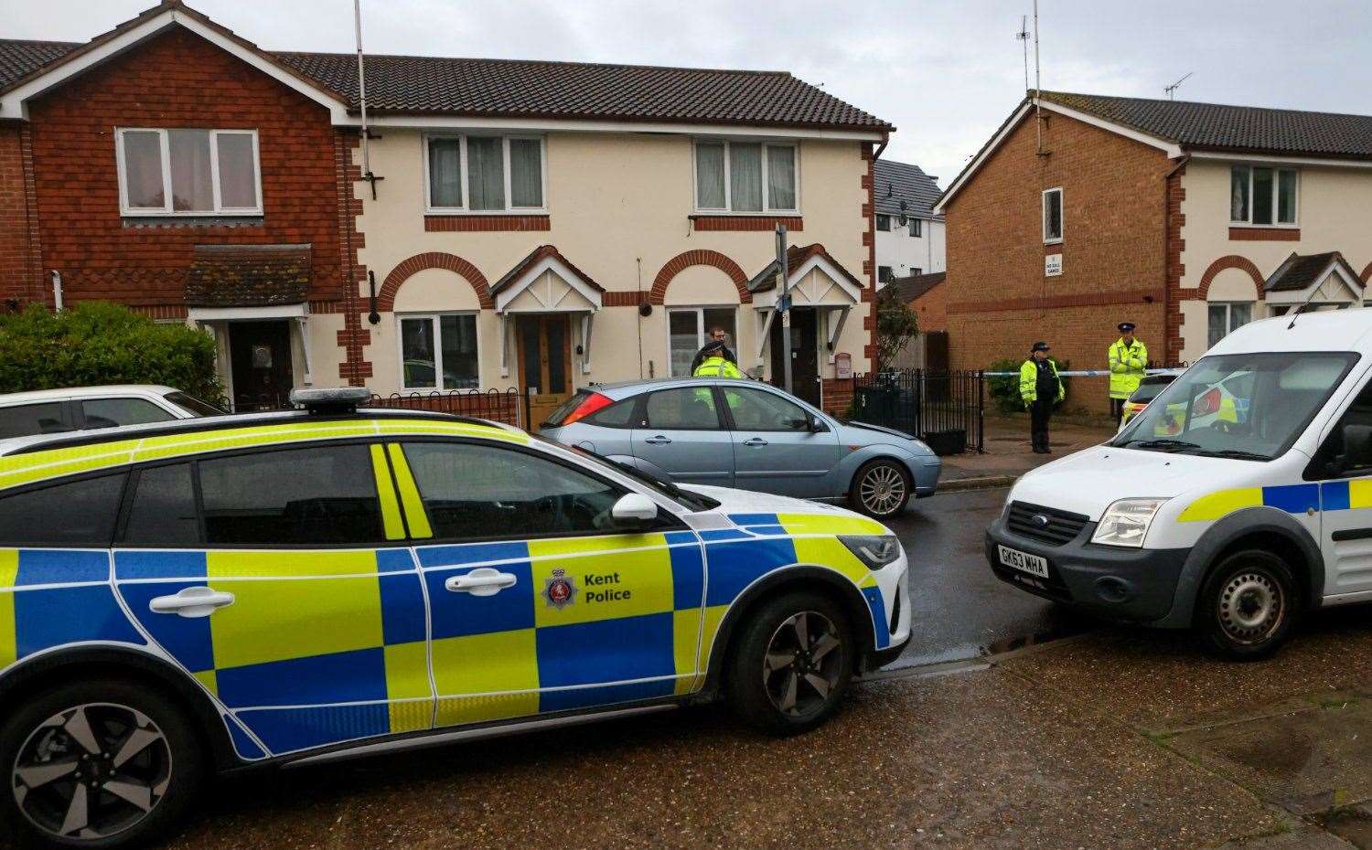 Police at the scene after the firearms incident. Picture: UKNIP